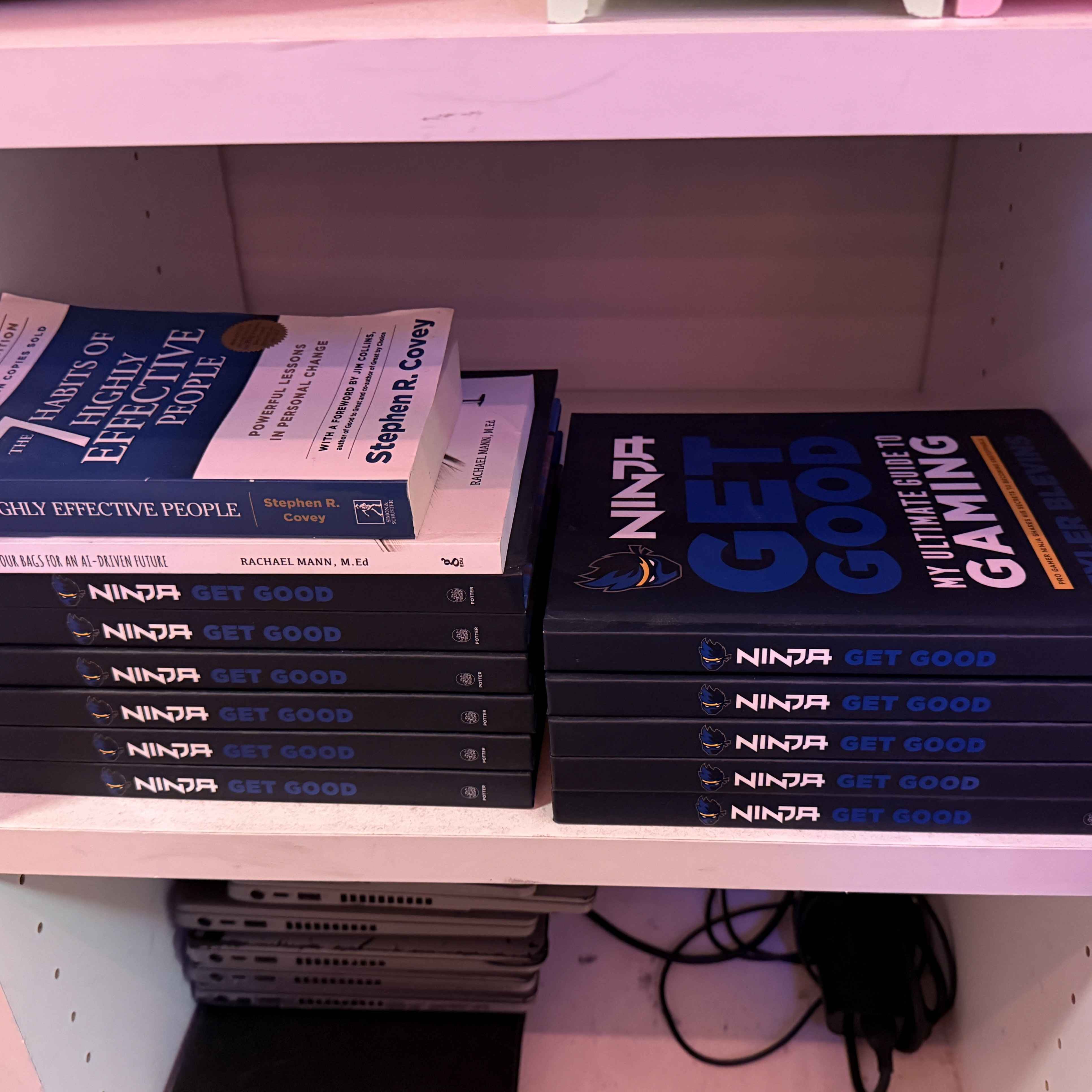 Ninja Get Good gaming guide books on a shelf